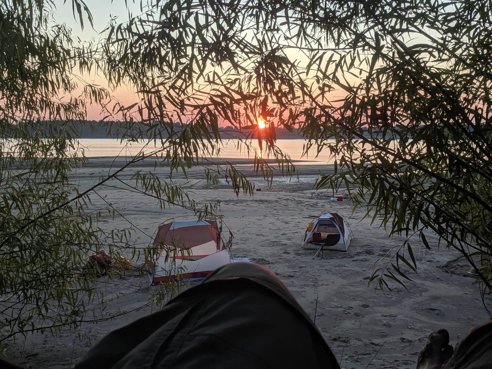 Camping on a Mississippi River sandbar at sunrise